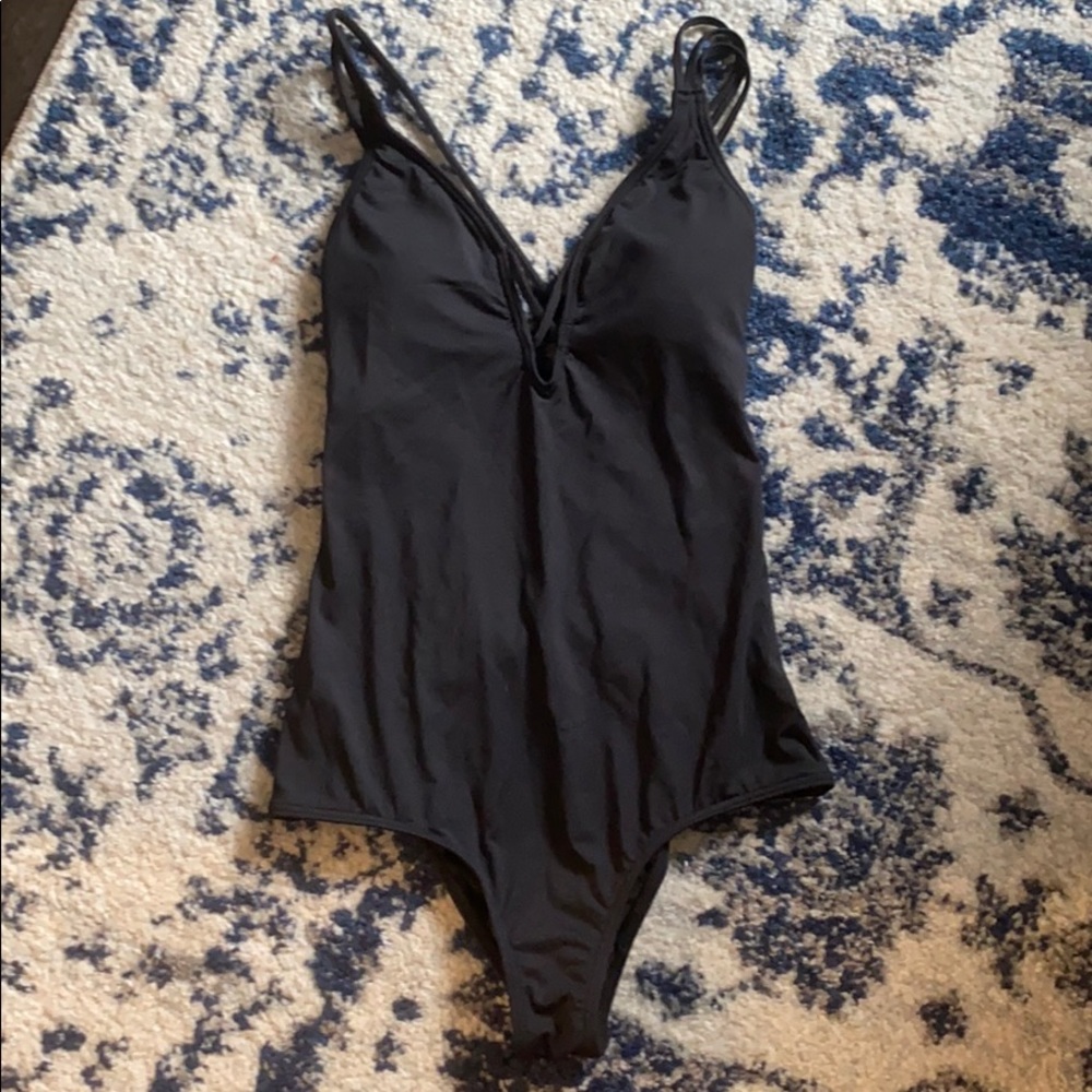 One piece open back bathing suit